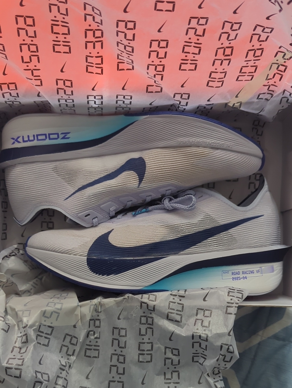 NWT Nike Vaporfly Racing Shoes with Navy Swoosh and Blue Sole Accents